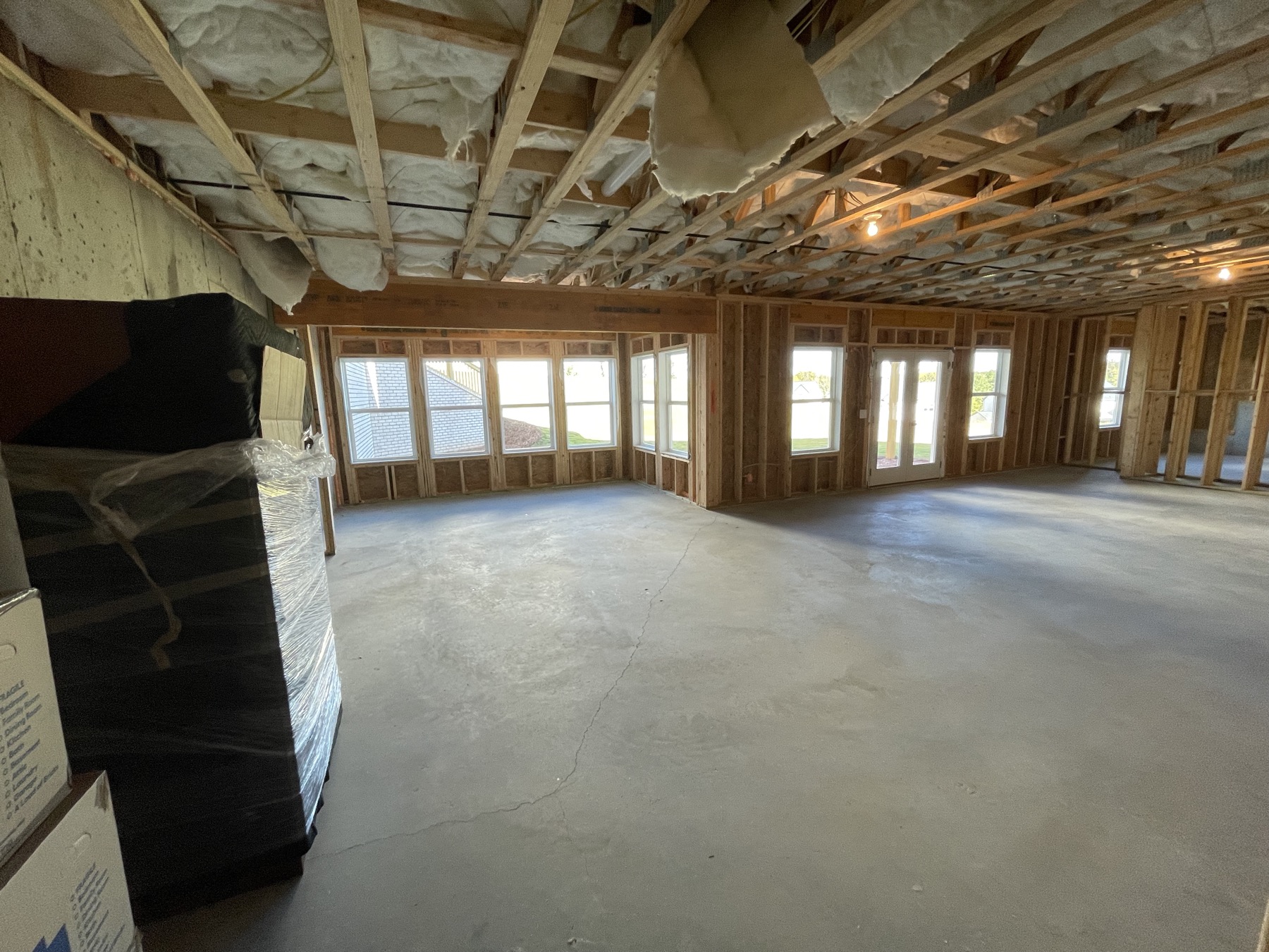 Unfinished basement bay window wall, another angle