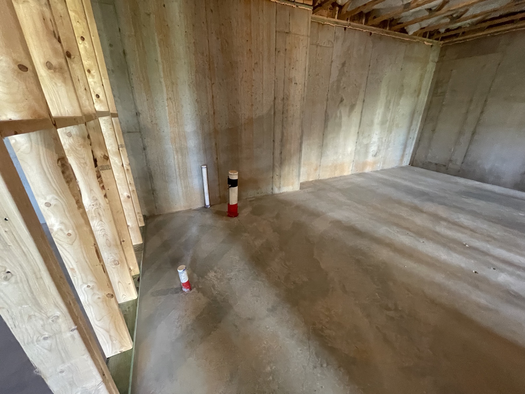 Unfinished basement concrete corner
