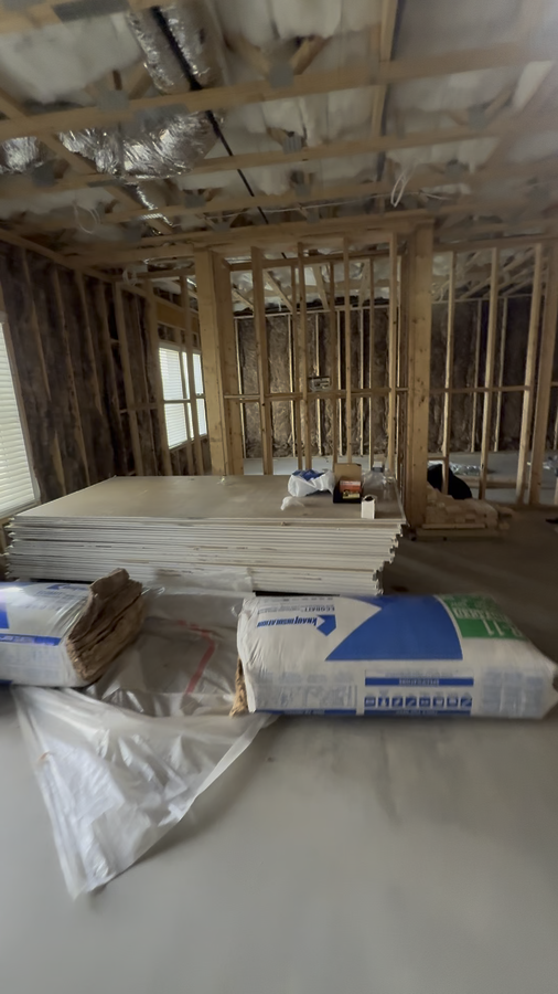 Drywall sheets stacked and ready for installation