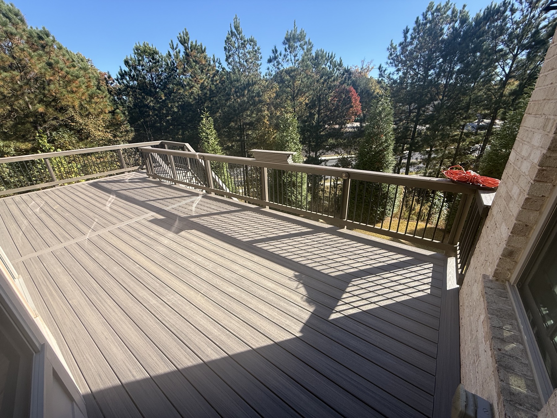 Elevated composite deck with cable railing