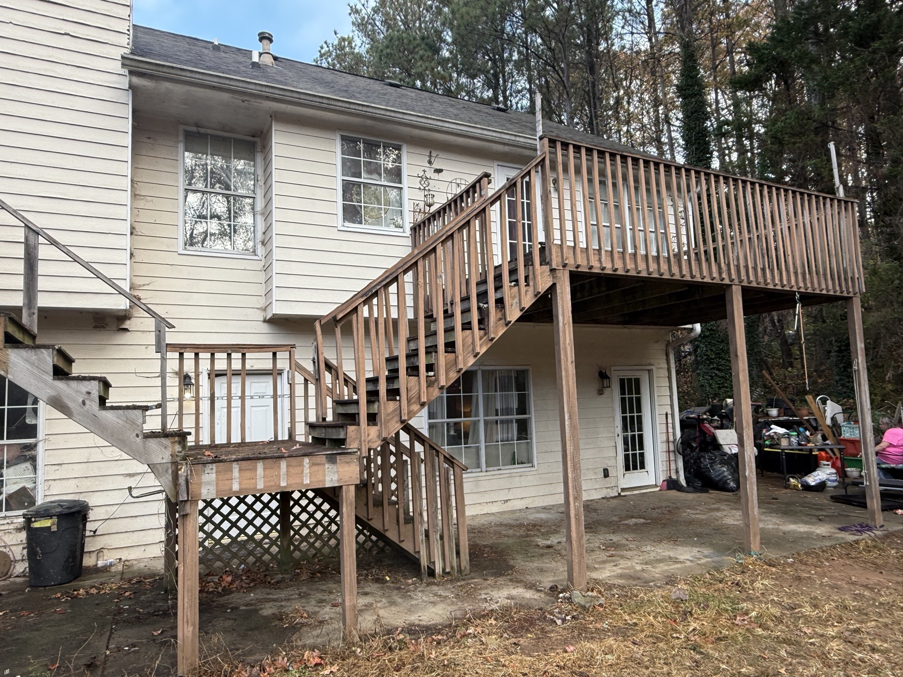 Old deteriorating wood deck before demolition