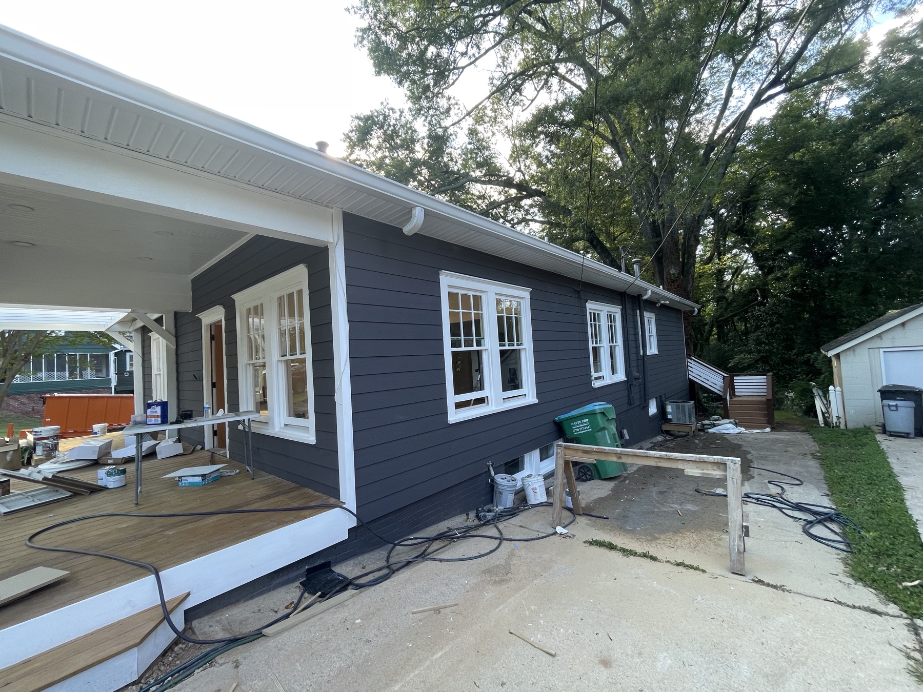 House exterior mid-repaint
