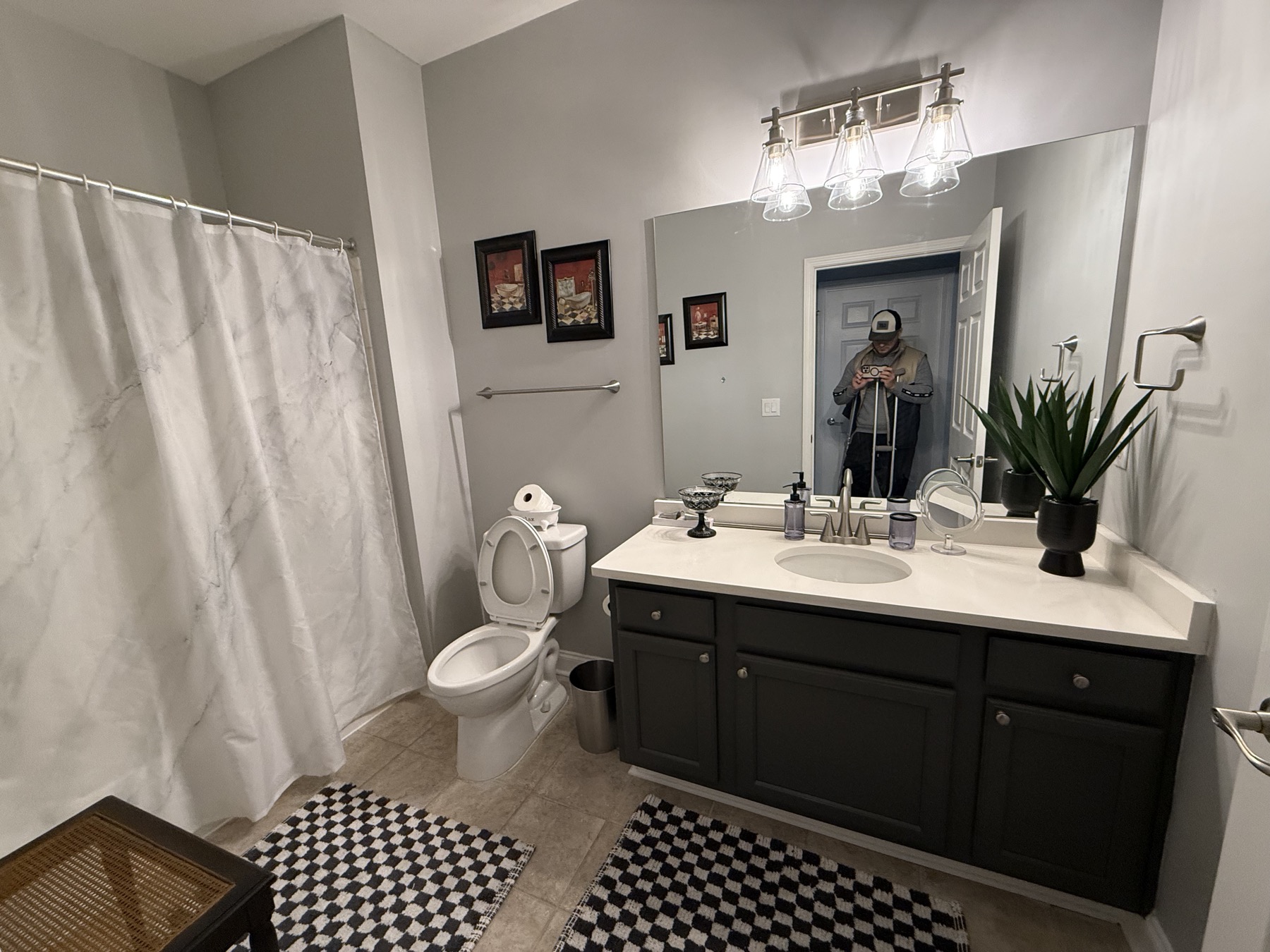 Bathroom with dark double vanity